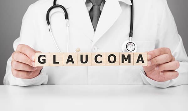 Doctor showing the word Glaucoma in a consultation 