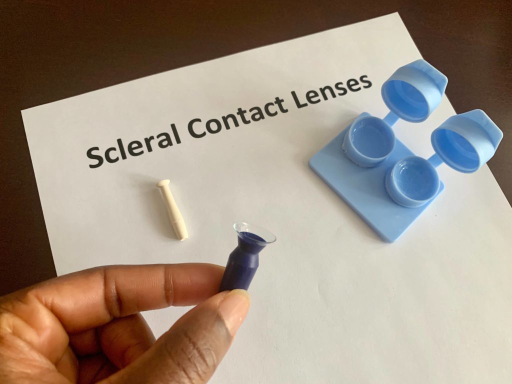 Scleral contact lenses are made from a firm material that fits the eye's shape, improving vision more than regular soft contacts